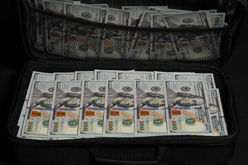 Cash American dollar in a suitcase. A suitcase of money