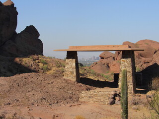 View from the Echo Canyon Camelback Mountain hiking trail of a covered, shaded area with modern...