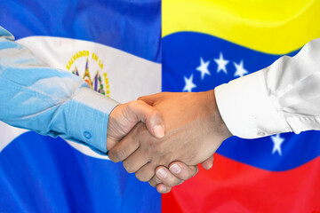 Business handshake on the background of two flags. Men handshake on the background of the El Salvador and flag. Support concept