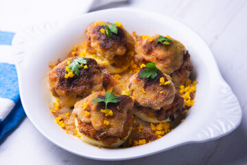 Stuffed eggs with iberico ham and cheese