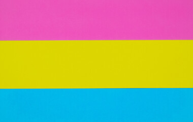 Fototapeta premium pansexual flag made with colored cardboard, pink, yellow and blue with space for text