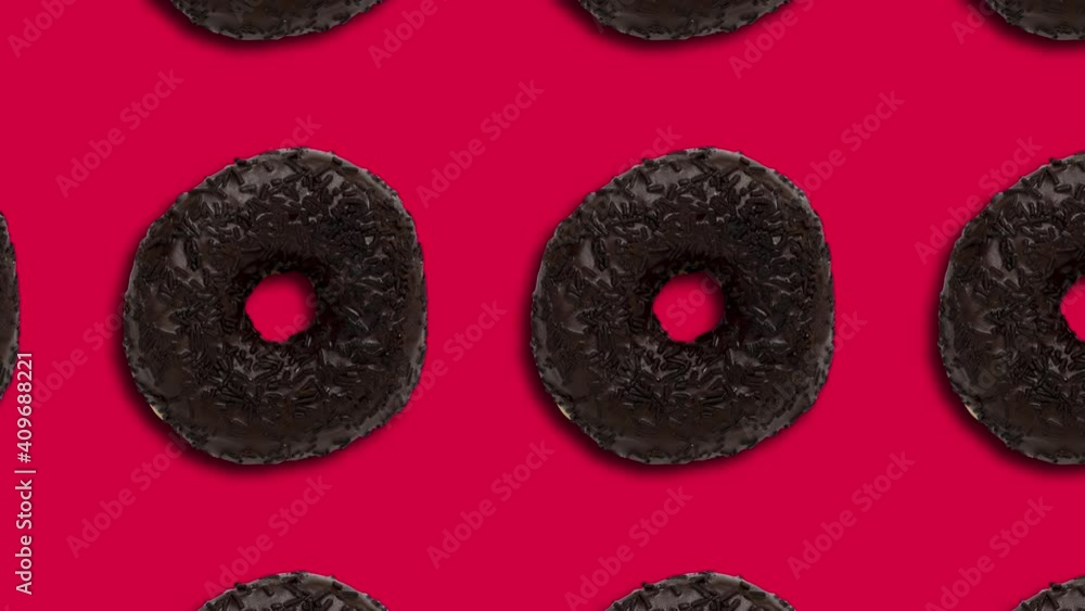 Poster chocolate doughnuts pattern on a red background. minimal motion graphics food animation