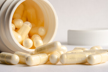 Vitamin A Capsules Spilled from a Bottle