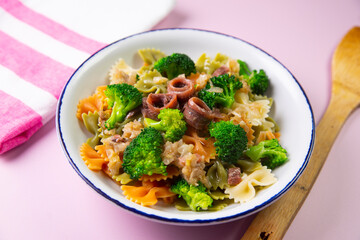 Colored pasta with broccoli and anchovies 