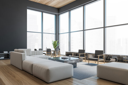 Modern office waiting area with grey armchairs and sofa, a marble coffee table, wooden parquet. Panoramic city view windows. Hotel relax area. 3d rendering