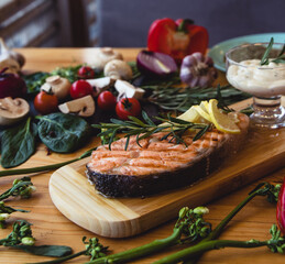 Salmon steak grilled with lemon