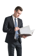 Young businessman reading document, isolated