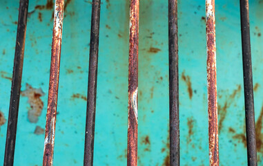 set of a rusty steel fence,rusted metal bars.Rust of metals.Corrosive Rust.