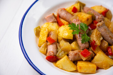 Salchichas stew with potatoes and paprika