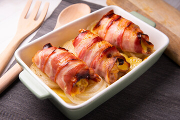 Roll with bacon and chicken backed in the oven