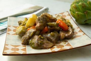 Beef stew with artichokes. Traditional dish from Barcelona.