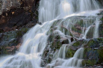 Fototapeta na wymiar majestic summer mountain waterfall in northern Norway