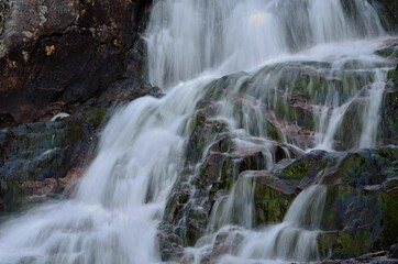 Fototapeta na wymiar majestic summer mountain waterfall in northern Norway