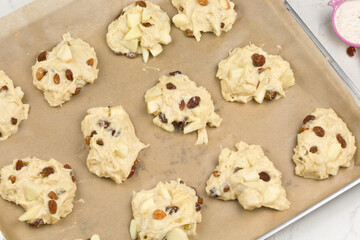 Yeast pastries with apple and raisins series image 06