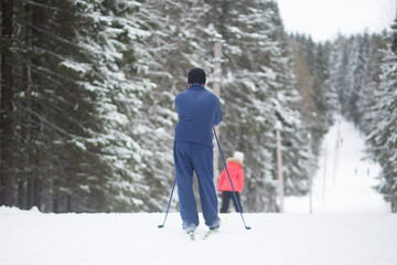 Cross country ski. Skiing in winter on the track.