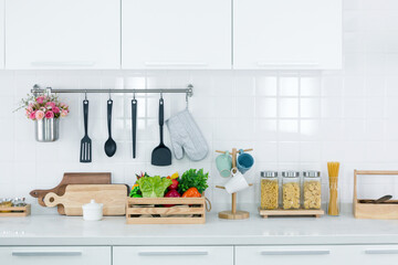 Modern white kitchen interior background with counter, Decoration top surface ceramic tile counter, Empty Copy space for text. for use mockup product display.