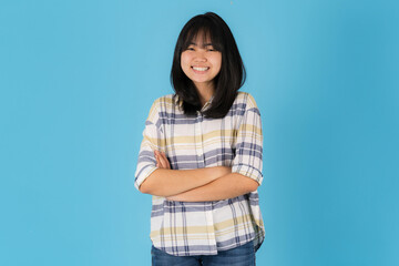Happy asian girl Standing on a blue background