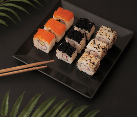 Set of rolls on plate. Japanese food.