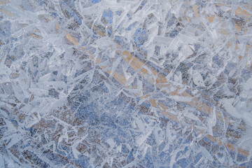 Waves, patterns, air, frozen water in nature. Abstract ice drawing.