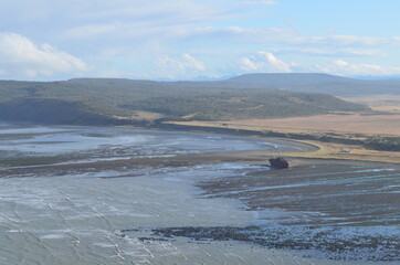 Abandoned ship on the horizon