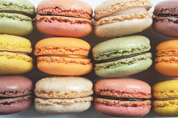 Set of french traditional macaroons or macarons of different colors, close-up