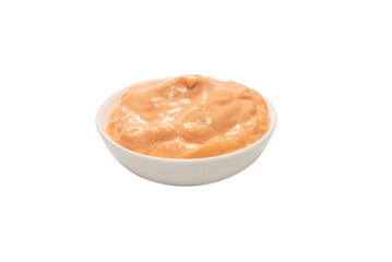 Sauce in a bowl isolated on white.