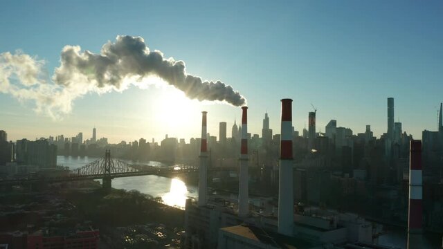 late afternoon flying counter clockwise around smoking LIC power plant