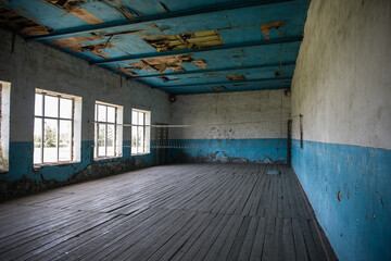 Empty grunge abandoned hall. Dirty interior.