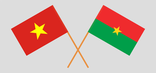 Crossed flags of Vietnam and Burkina Faso