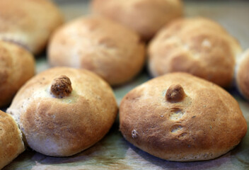 Warm and fresh homemade bread rolls. Food background