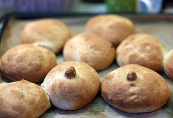 Warm and fresh homemade bread rolls. Food background