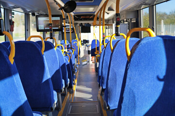 The public transport bus inside view .