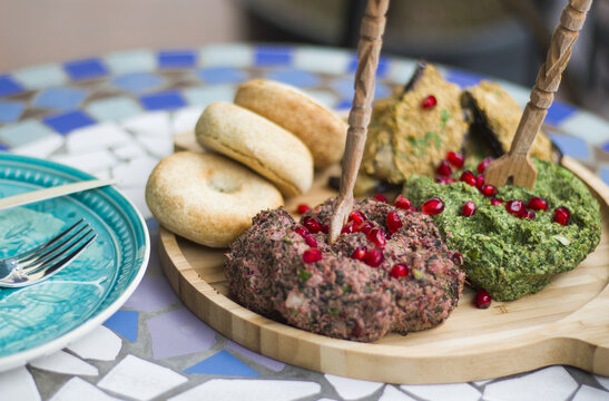 Traditional Georgian food Pkhali dish with vegetables and pomegranate seeds
