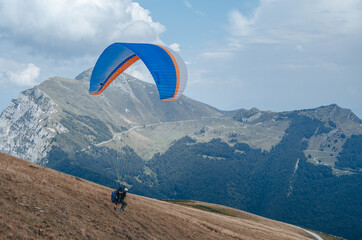 Flying on a paraglider.  View of the Monte Baldo mountain, Italy, from a height.