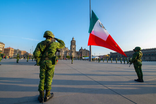 Raising Flag ceremony on Zocalo at Historic center of Mexico City CDMX, Mexico. Historic center of Mexico City is a UNESCO World Heritage Site since 1987.