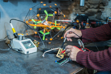 working in an industrial electronics workshop for drones