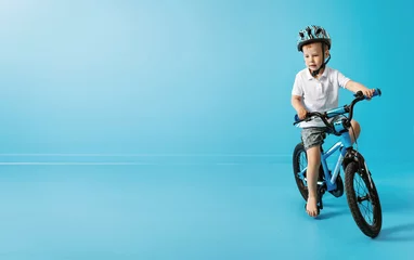 Foto op Aluminium Picture of little boy riding a bike - riding lesson © konradbak