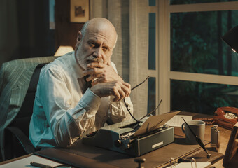 Vintage style businessman working in his office