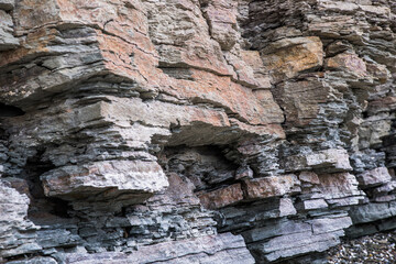 Geologic rock formation, stone background.The texture of a rocky rock.