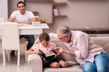 Fototapeta premium Three generations at home during pandemic