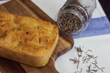 Rustic homemade bread made from rosemary and oats. Healthy homemade bread recipe. 