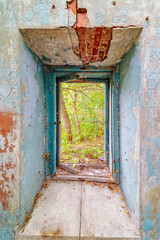 exit with a knocked down door leading outside in an old house, isolate