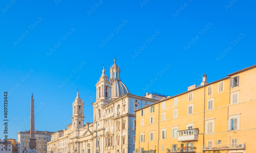 Wall mural sunrise light on piazza navona (navona square) buildings in rome, italy