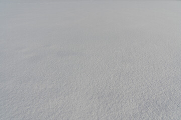 A clear patch of fresh, frozen snow