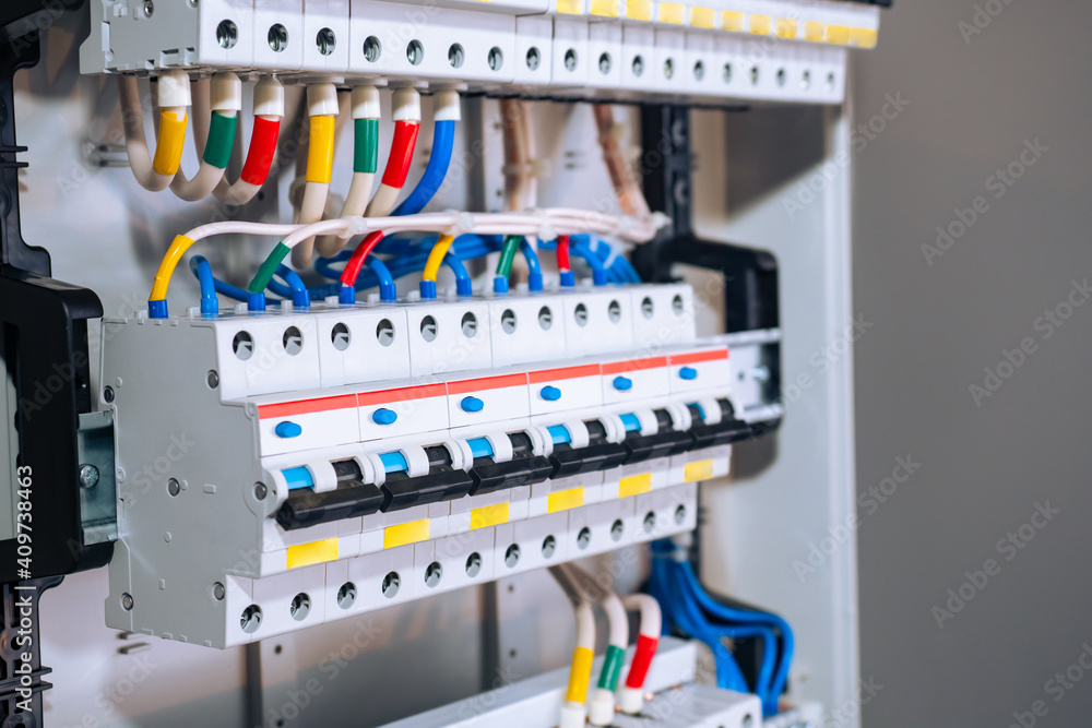 Poster voltage switchboard with circuit breakers. electric background. electric switchboard with multi-colo