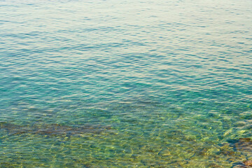 The turquoise waters of the Mediterranean Sea are like a natural backdrop.