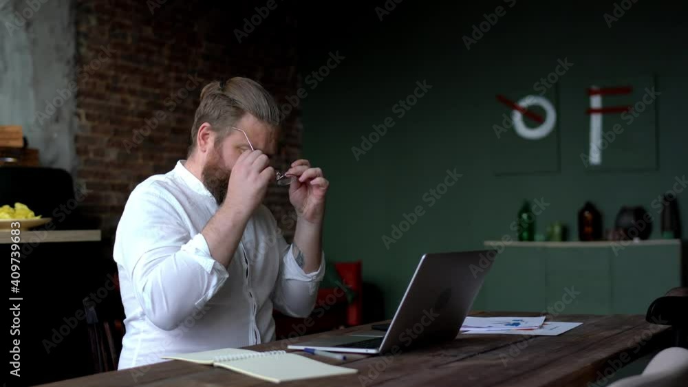 Poster excited caucasian freelancer searching web information on laptop website using bluetooth connection 