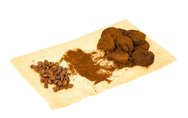 Coffee beans, ground and pressed espresso residues. Studio Photo