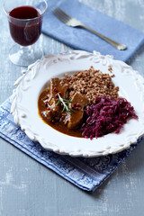 Traditional, handcrafted ceramic on gray background. Soft focus. Copy space.