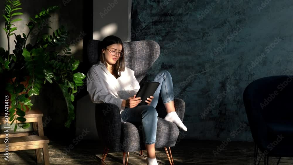 Aufkleber hipster girl in eyeglasses for vision protection using home internet connection for wireless browsin